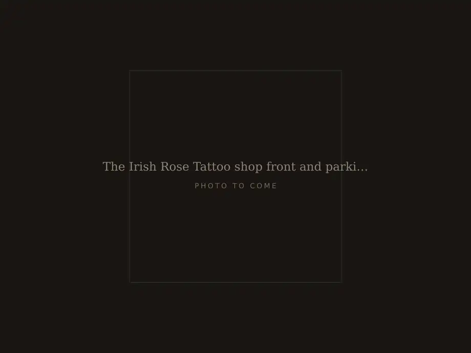The Irish Rose Tattoo shop front and parking lot at 9 East Ave in Westerly