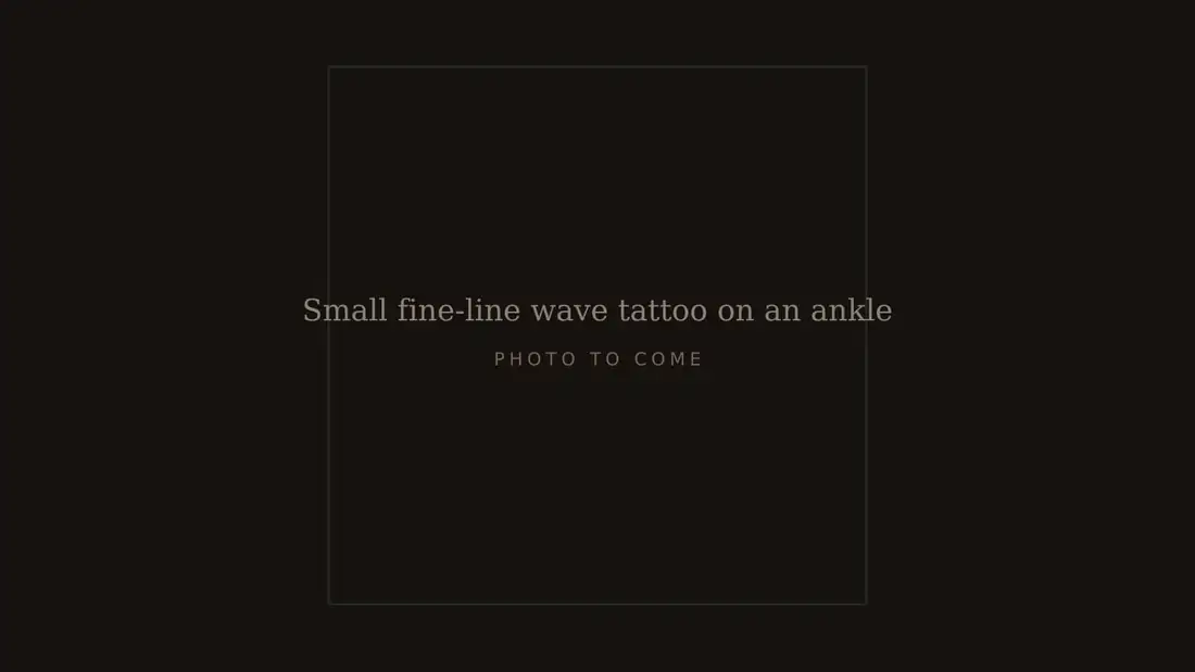 Small fine-line wave tattoo on an ankle, fresh, with Misquamicut beach in the background